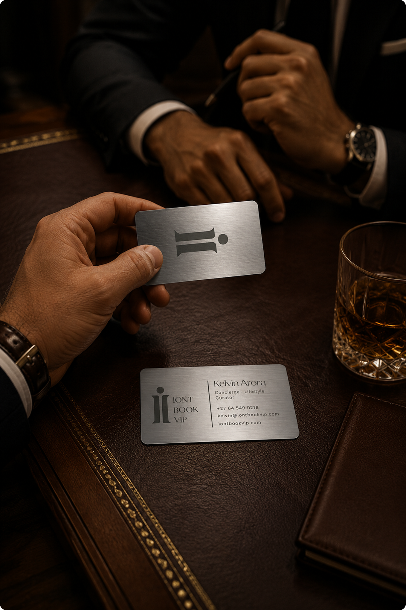 IOnlyBookVIP brushed metal member card and business card for Kelvin Arora, concierge and lifestyle curator